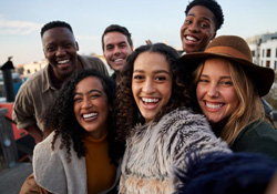 Diverse group of friends taking a selfie