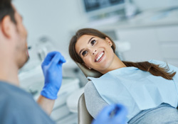 Dentist and patient talking during appointment