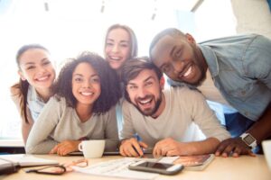 Smiling group of young adult coworkers